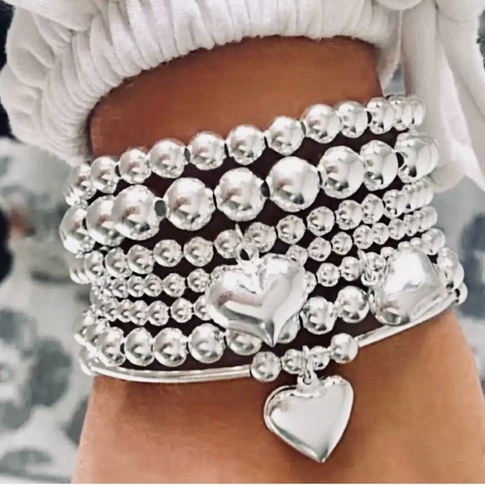 7pcs Bohemian Style Minimalist CCB
Beaded Stackable Bracelet Set